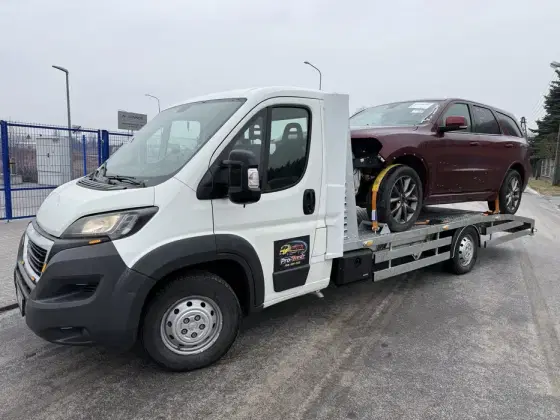 Laweta 24h Wołomin Warszawa Autolaweta pomoc drogowa transport auta