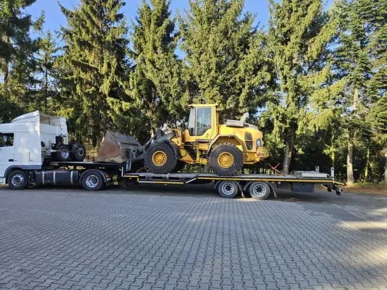 Transport maszyn rolniczych, budowlanych, pomoc drogowa, laweta.